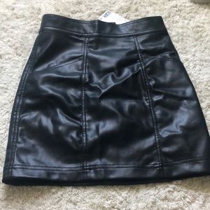 Black leather mini skirt